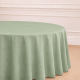 Round sage green tablecloth with elegant draping