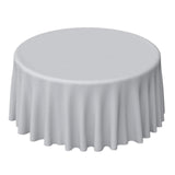 Round table with a white tablecloth in a studio-style shot