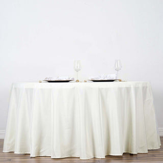 Elevate Your Event with the Ivory Seamless Polyester Round Tablecloth