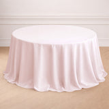 Round pink tablecloth draped elegantly over a table