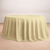 Round yellow tablecloth draped elegantly over a table.