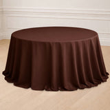 Brown round tablecloth draped elegantly over a table in a stylish setting.