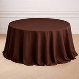 Brown round tablecloth draped over a circular table