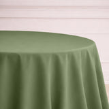 Olive green round tablecloth on a light background.