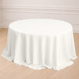 Round white tablecloth draped elegantly over a table.