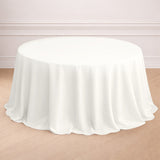 White round tablecloth draped elegantly over a circular table.
