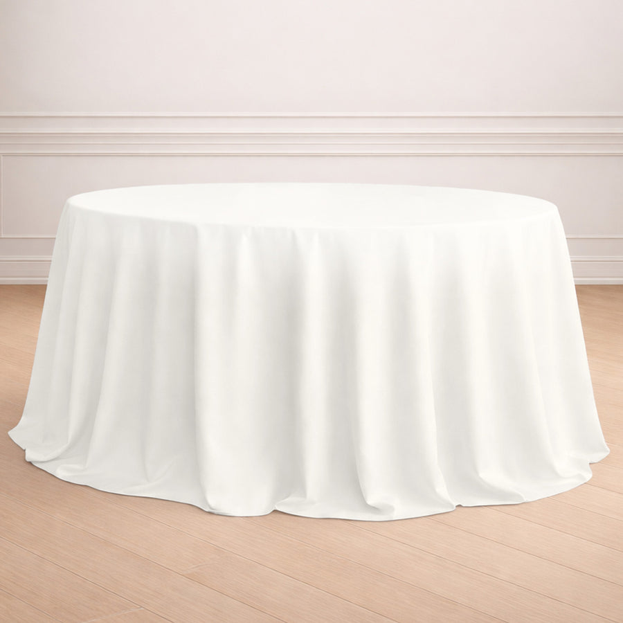 White round tablecloth draped elegantly over a table.