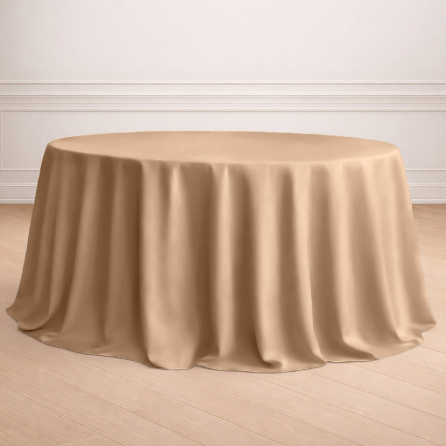 Beige round tablecloth draping elegantly on a round table.