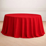 Red round tablecloth draped elegantly over a table.