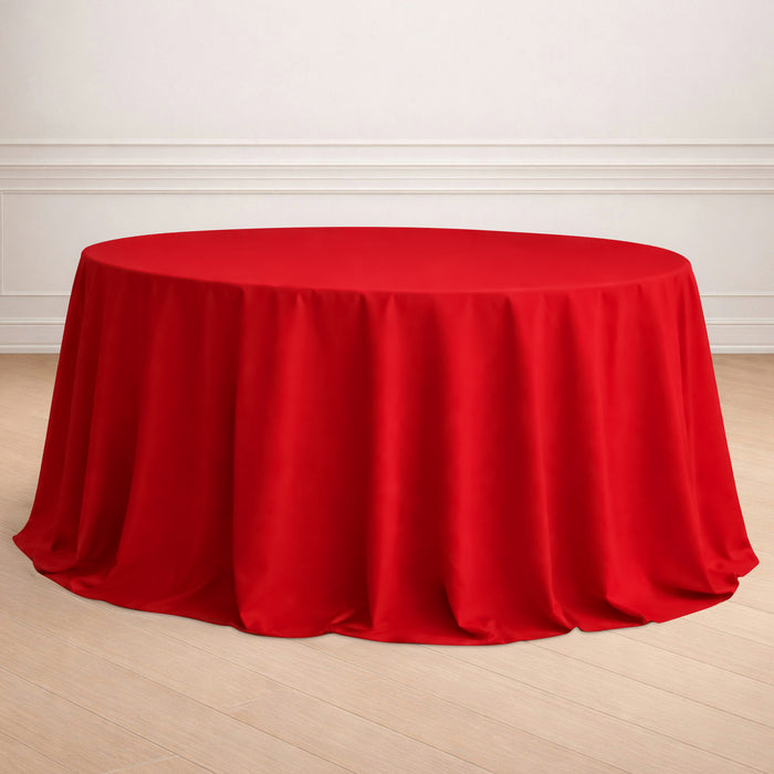 Red round tablecloth draped elegantly over a table.