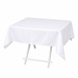 White rectangular tablecloth on folding table stand