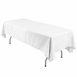 White rectangular tablecloth on folding table in a clean studio shot