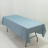 Light blue rectangular tablecloth on a folding table
