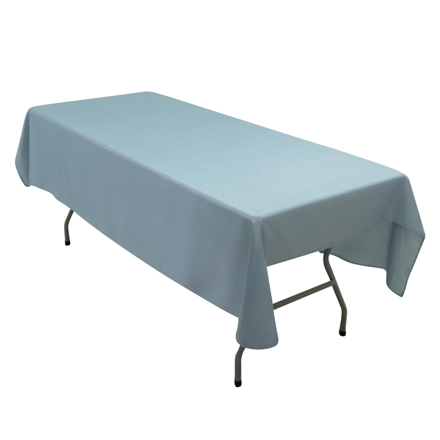 Light blue tablecloth draped over a folding table.