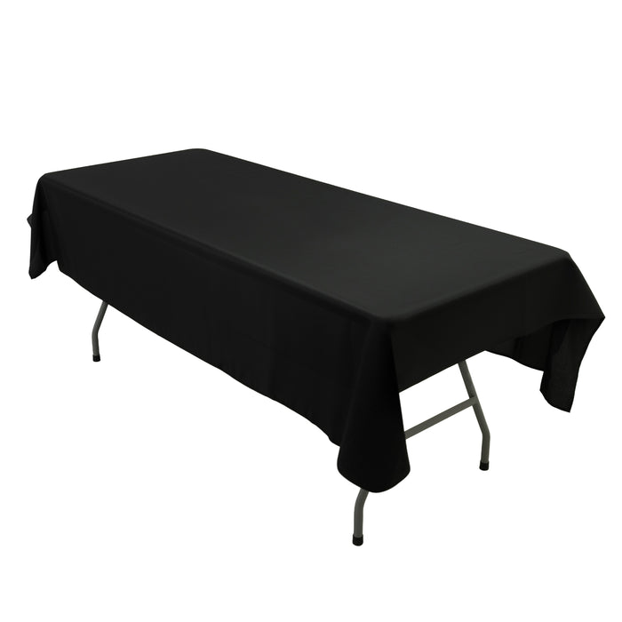 Black tablecloth draped over a folding table on a white background.
