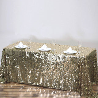 Add Elegance to Your Event with the 90"x156" Champagne Seamless Big Payette Sequin Rectangle Tablecloth