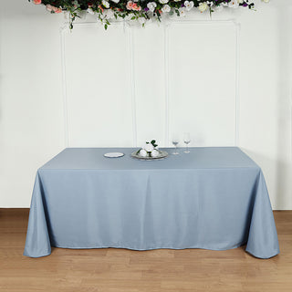 Elevate Your Event with the Dusty Blue 90"x132" Seamless Polyester Rectangular Tablecloth