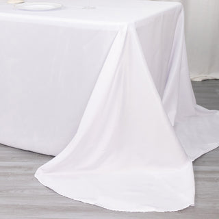 Create Unforgettable Moments with the 90"x156" White Seamless Polyester Round Corner Tablecloth