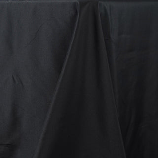Create Unforgettable Memories with the 90"x132" Black Seamless Premium Polyester Rectangular Tablecloth