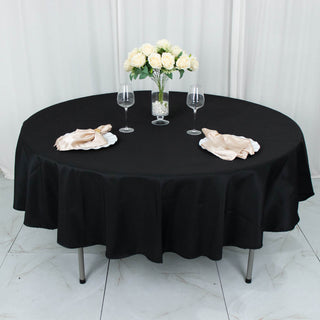 Elevate Your Event with the 90" Black Seamless Premium Polyester Round Tablecloth