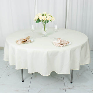 Elevate Your Event with the 90" Ivory Round Tablecloth