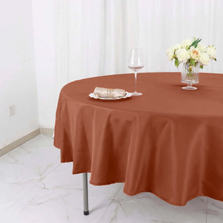 Create a Chic and Stylish Ambiance with the Terracotta (Rust) 90" Polyester Round Tablecloth