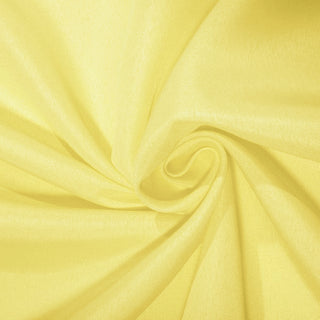 Elevate Your Event Decor with the 90" Yellow Seamless Polyester Round Tablecloth