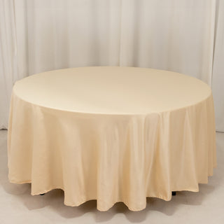 <h3 style="margin-left:0px;"><strong>Effortless Elegance with the Beige Lamour Satin Round Tablecloth</strong>