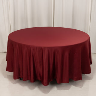 <h3 style="margin-left:0px;"><strong>Effortless Elegance with the Burgundy Lamour Satin Round Tablecloth</strong>