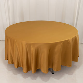 <h3 style="margin-left:0px;"><strong>Effortless Elegance with the Gold Lamour Satin Round Tablecloth</strong>