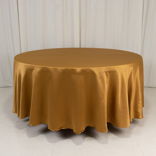 <h3 style="margin-left:0px;"><strong>Effortless Elegance with the Gold Lamour Satin Round Tablecloth</strong>