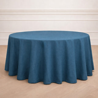 Round blue tablecloth displayed on a wooden surface.