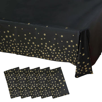 5 Pack Black Rectangle Plastic Table Covers with Gold Stars, 54"x108" PVC Waterproof Disposable Tablecloths