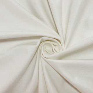 White fabric in a spiral pattern showcasing smooth texture. #whtbkgd