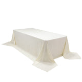 White tablecloth draped over a rectangular table
