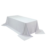 White tablecloth draped elegantly over a long table