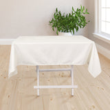 Elevate Your Table Setting with the Ivory Scuba Polyester Tablecloth
