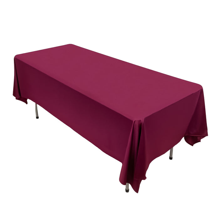 Burgundy tablecloth draped over a rectangular table
