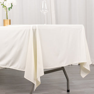 Create a Sophisticated and Seamless Event Decor with Our Ivory Premium Scuba Polyester Tablecloth