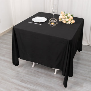 Make a Statement with the 70" Black Premium Scuba Wrinkle Free Square Tablecloth