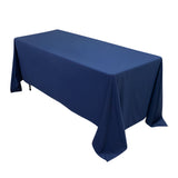Navy blue tablecloth draped over a rectangular table
