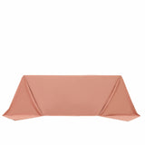 Peach table cover draped elegantly on a plain surface