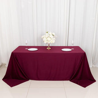 Experience Luxury and Convenience with the Burgundy Premium Scuba Rectangular Tablecloth