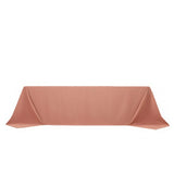 Rose-colored tablecloth draped elegantly on a table