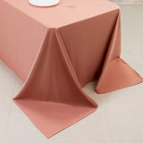 Peach tablecloth draped elegantly over a table.
