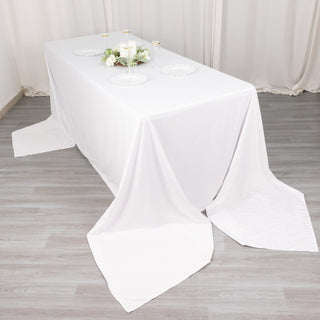 Create an Impeccable Table Setup with the White Premium Scuba Wrinkle Free Rectangular Tablecloth