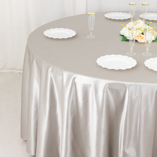 <strong>Enhance Your Dining Table with Shimmer Silver Premium Scuba Round Tablecloth</strong>