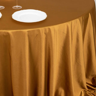 <strong>Enhance Your Dining Space with Shimmer Gold Premium Scuba Round Tablecloth</strong>