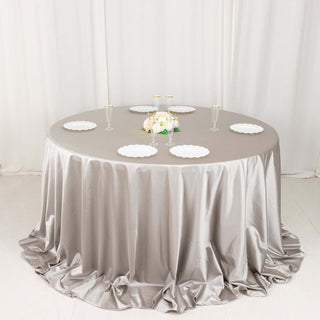 <strong>Elevate Your Dining Experience with Shimmer Silver Premium Scuba Round Tablecloth</strong>