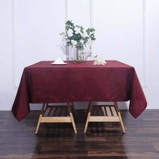 Add Elegance to Your Event with a Burgundy Square Seamless Polyester Tablecloth